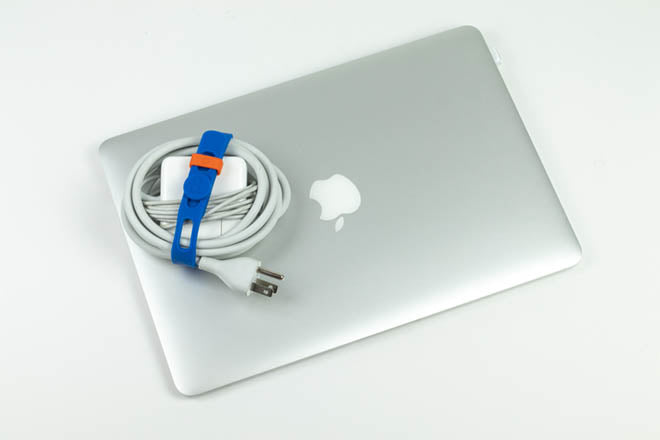Reusable silicone Packbands hold extension and charger cords and cables in the office, home office, garage and workshop 